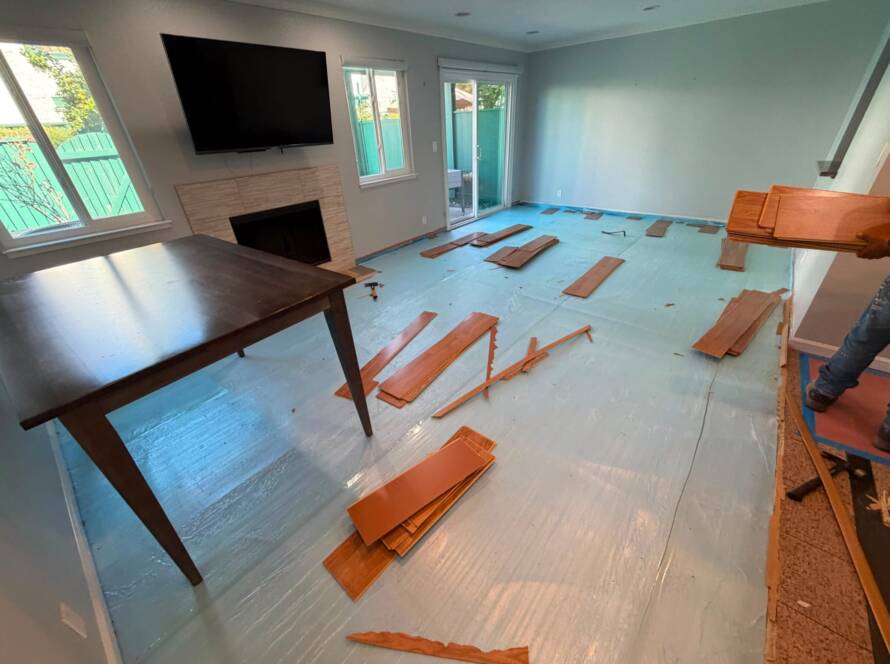 Renovation in progress with old flooring coming up