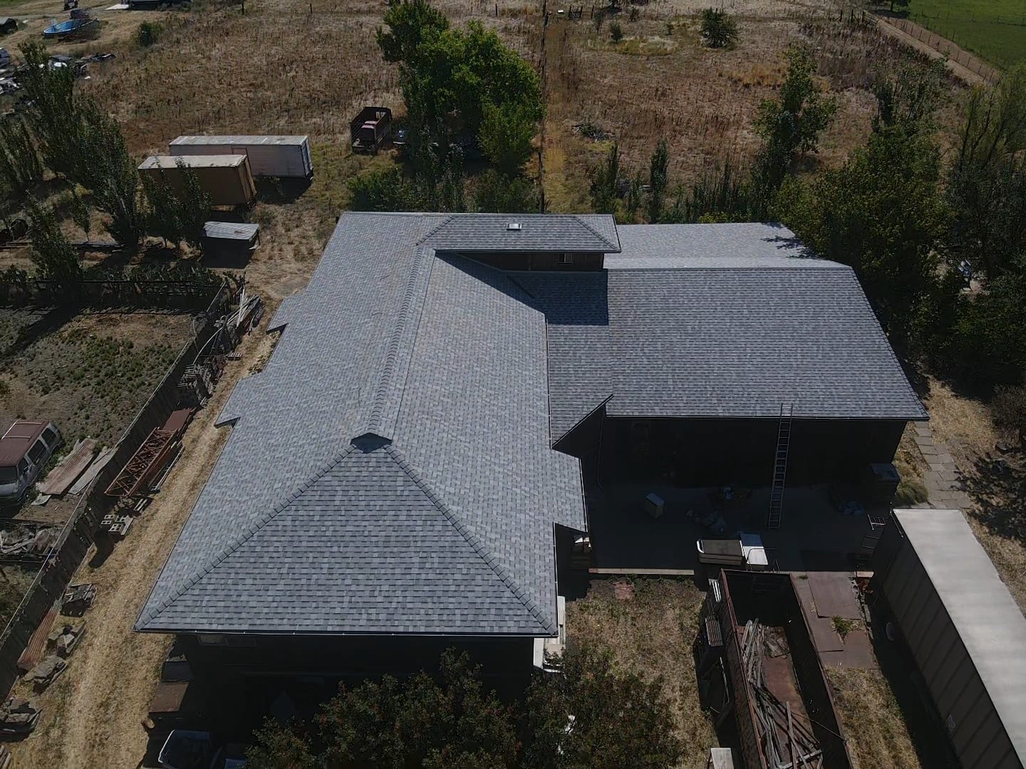 The second building's new shingle roof, seen from above